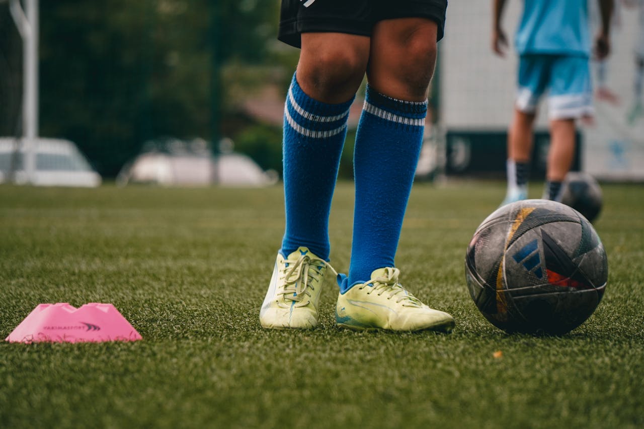 Mastering the First Impression: Your intriguing post title goes here Teenagers practicing soccer on a lush outdoor field in Kyiv, Ukraine.